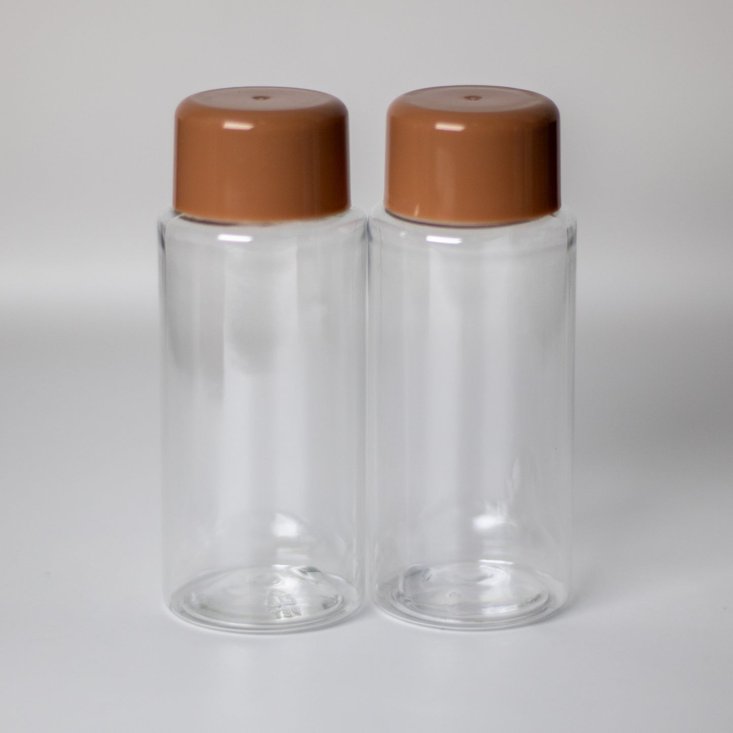 7-Piece Refillable Travel Bottle Set (Brown
