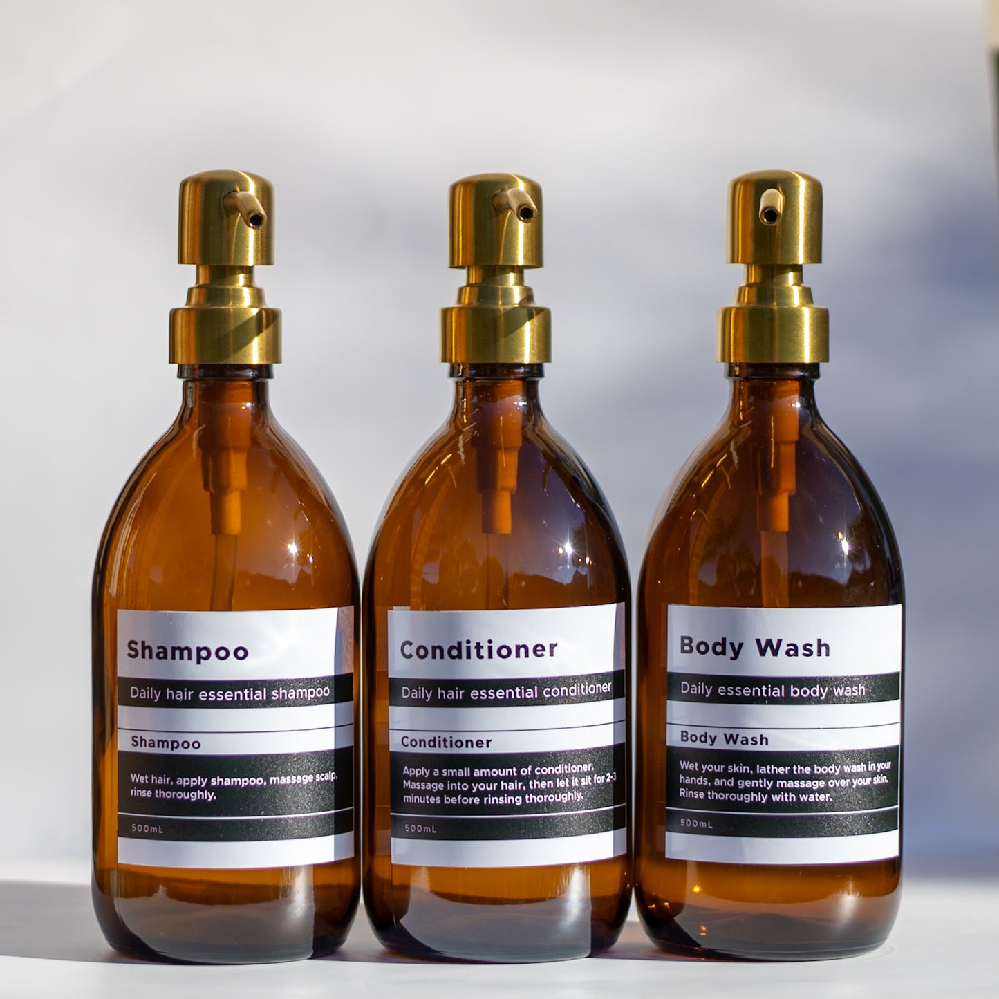Set of 3 – 500ml Amber Glass Dispenser with Gold Pump & Labels